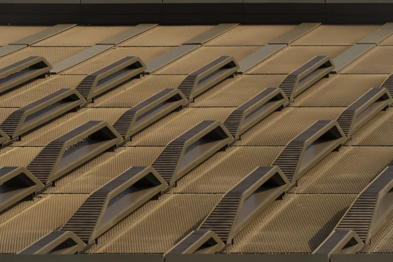 Architectural photograph by Deed Studio of the award-winning Wasl Tower in Dubai, designed by UNStudio, highlighting its iconic ceramic façade and presence within the GCC urban skyline.