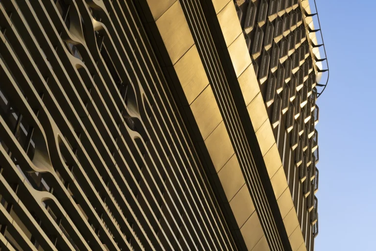 Architectural photograph by Deed Studio of the award-winning Wasl Tower in Dubai, designed by UNStudio, highlighting its iconic ceramic façade and presence within the GCC urban skyline.