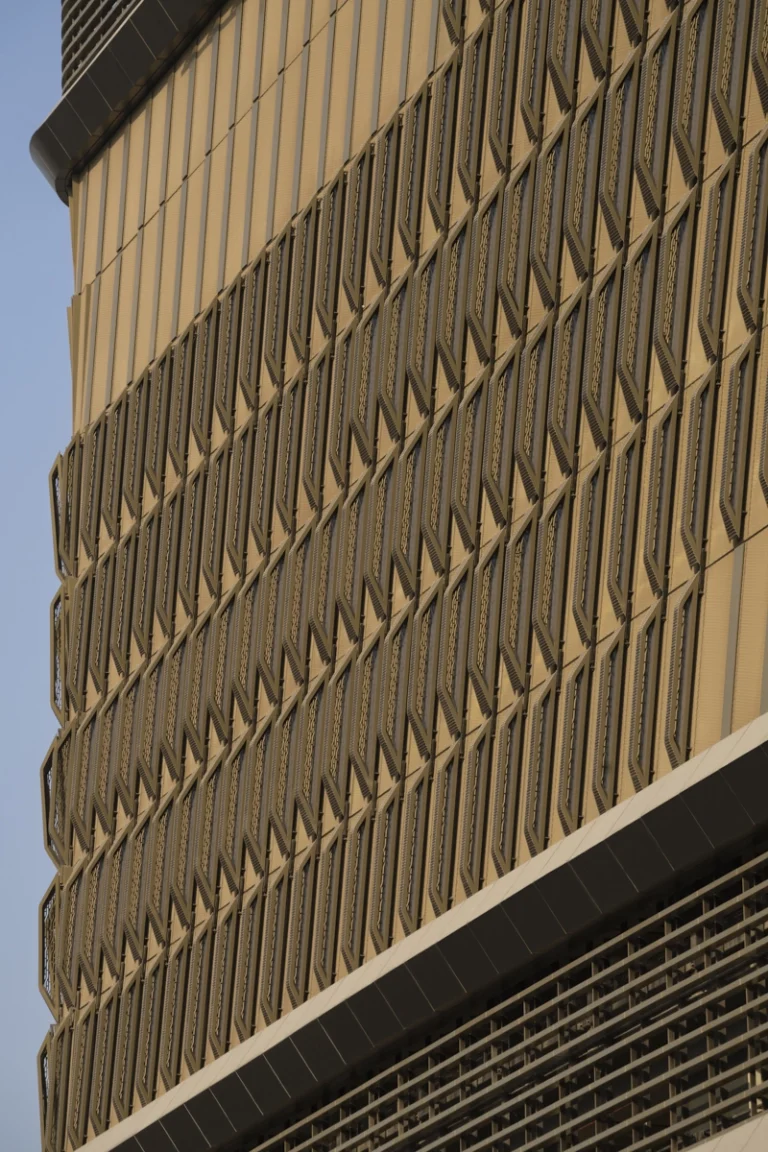 Architectural photograph by Deed Studio of the award-winning Wasl Tower in Dubai, designed by UNStudio, highlighting its iconic ceramic façade and presence within the GCC urban skyline.