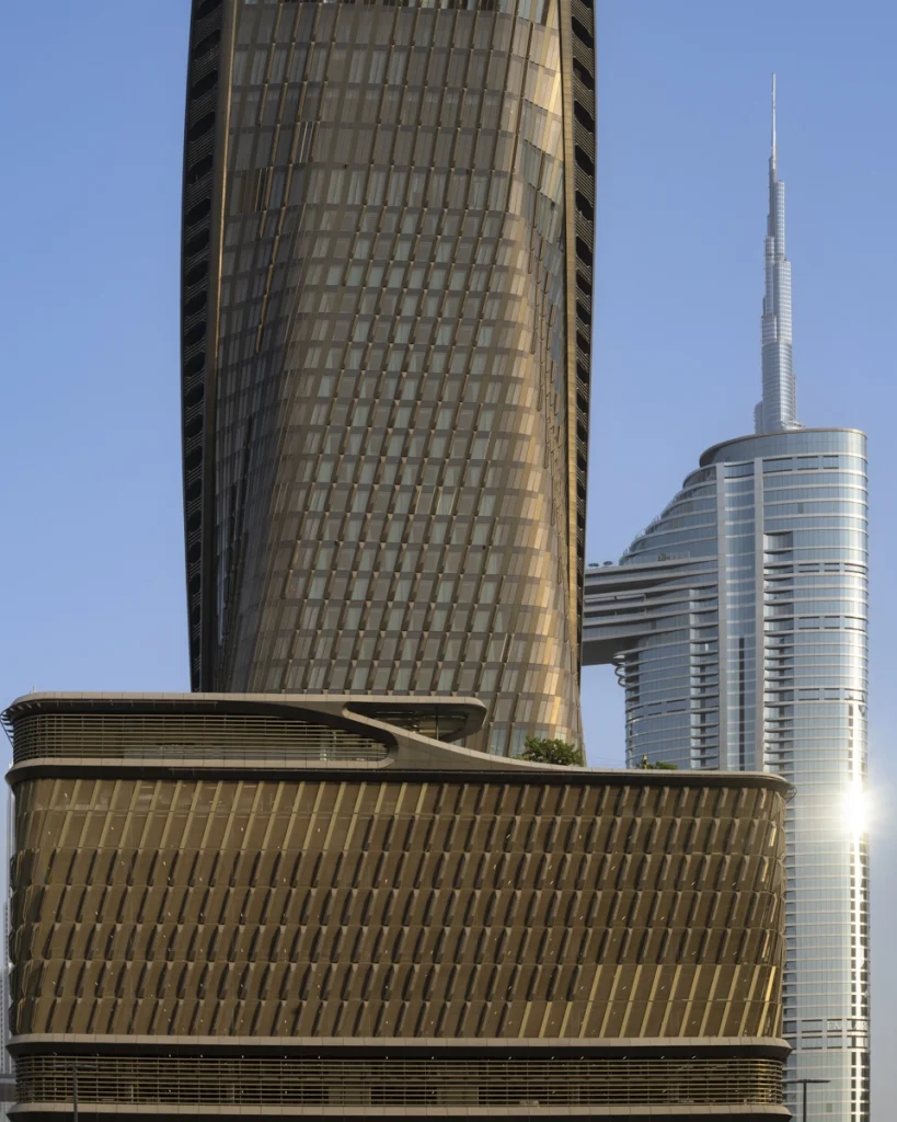 Architectural photograph by Deed Studio of the award-winning Wasl Tower in Dubai, designed by UNStudio, highlighting its iconic ceramic façade and presence within the GCC urban skyline.
