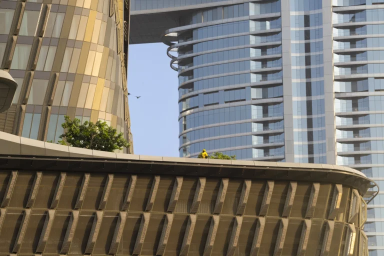 Architectural photograph by Deed Studio of the award-winning Wasl Tower in Dubai, designed by UNStudio, highlighting its iconic ceramic façade and presence within the GCC urban skyline.