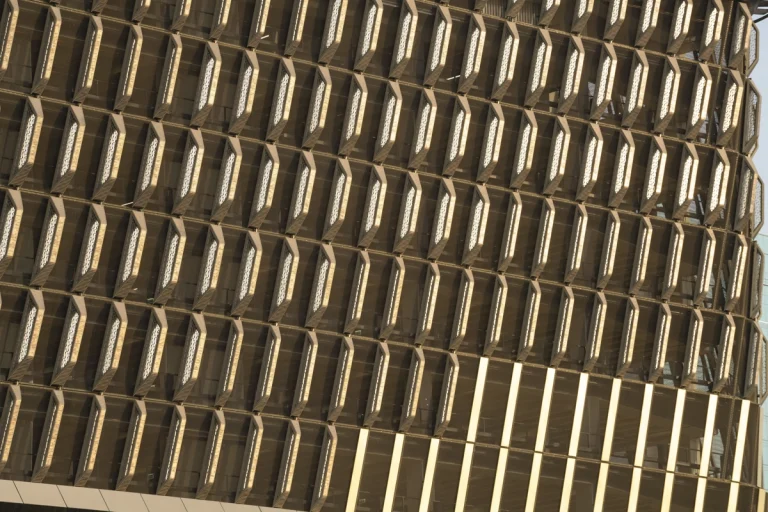 Architectural photograph by Deed Studio of the award-winning Wasl Tower in Dubai, designed by UNStudio, highlighting its iconic ceramic façade and presence within the GCC urban skyline.