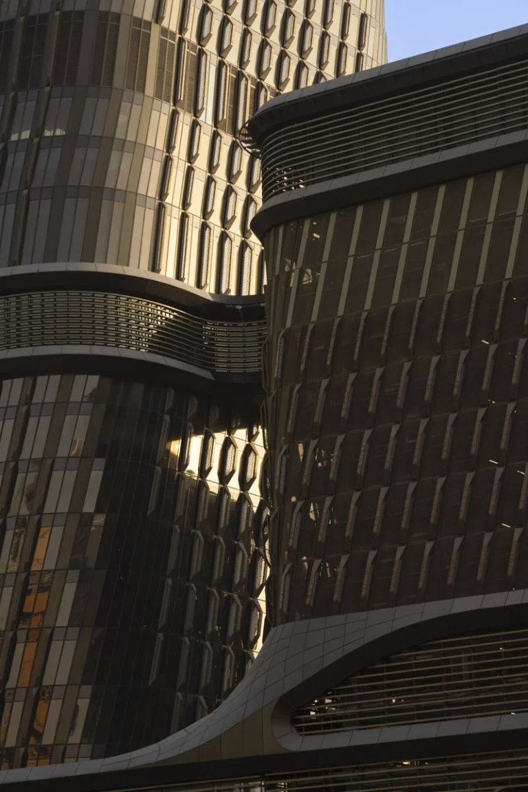Architectural photograph by Deed Studio of the award-winning Wasl Tower in Dubai, designed by UNStudio, highlighting its iconic ceramic façade and presence within the GCC urban skyline.