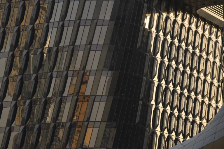 Architectural photograph by Deed Studio of the award-winning Wasl Tower in Dubai, designed by UNStudio, highlighting its iconic ceramic façade and presence within the GCC urban skyline.