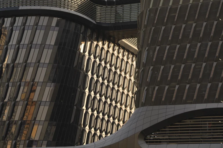 Architectural photograph by Deed Studio of the award-winning Wasl Tower in Dubai, designed by UNStudio, highlighting its iconic ceramic façade and presence within the GCC urban skyline.