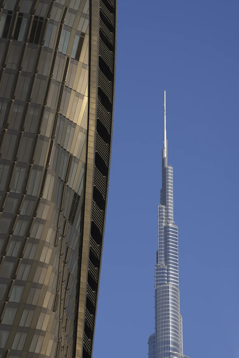 Architectural photograph by Deed Studio of the award-winning Wasl Tower in Dubai, designed by UNStudio, highlighting its iconic ceramic façade and presence within the GCC urban skyline.