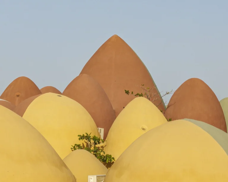 Architectural photograph of the Majara Complex and Community Redevelopment, an Aga Khan Award–winning project, captured by a worldwide architectural photography studio, highlighting the project’s vibrant forms and community-driven design