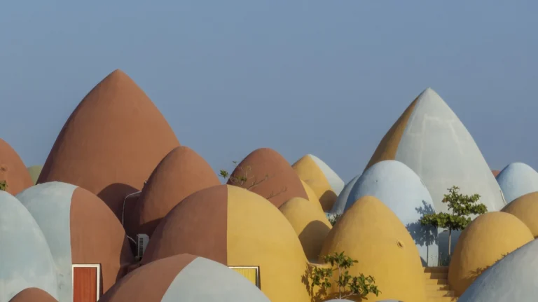 Architectural photograph of the Majara Complex and Community Redevelopment, an Aga Khan Award–winning project, captured by a worldwide architectural photography studio, highlighting the project’s vibrant forms and community-driven design