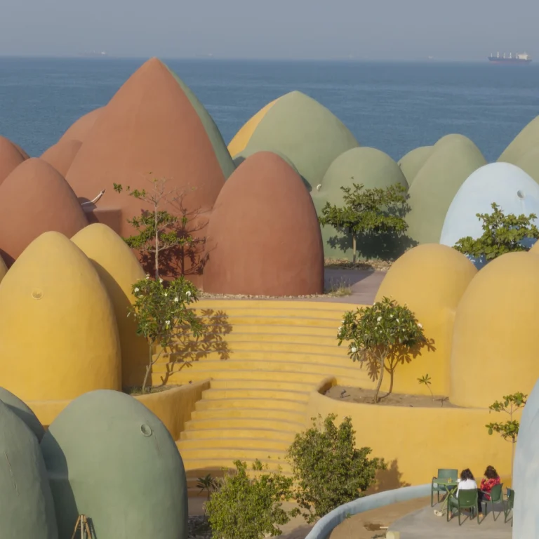 Architectural photograph of the Majara Complex and Community Redevelopment, an Aga Khan Award–winning project, captured by a worldwide architectural photography studio, highlighting the project’s vibrant forms and community-driven design