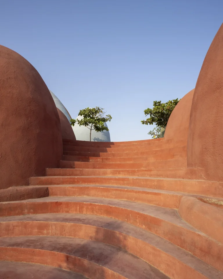 Architectural photograph of the Majara Complex and Community Redevelopment, an Aga Khan Award–winning project, captured by a worldwide architectural photography studio, highlighting the project’s vibrant forms and community-driven design