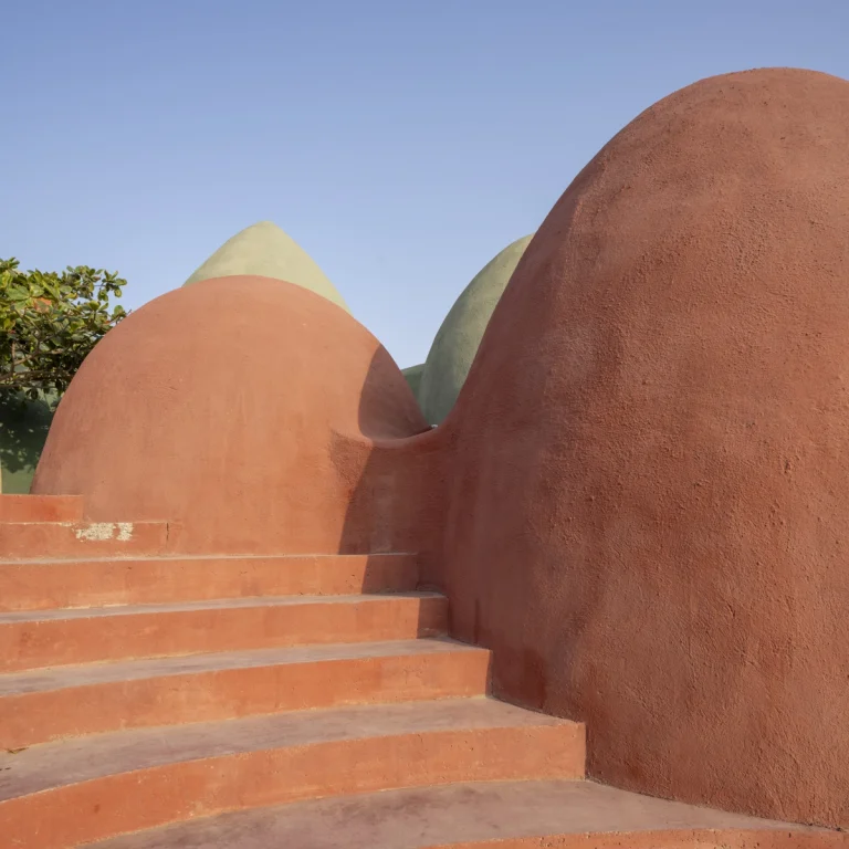 Architectural photograph of the Majara Complex and Community Redevelopment, an Aga Khan Award–winning project, captured by a worldwide architectural photography studio, highlighting the project’s vibrant forms and community-driven design