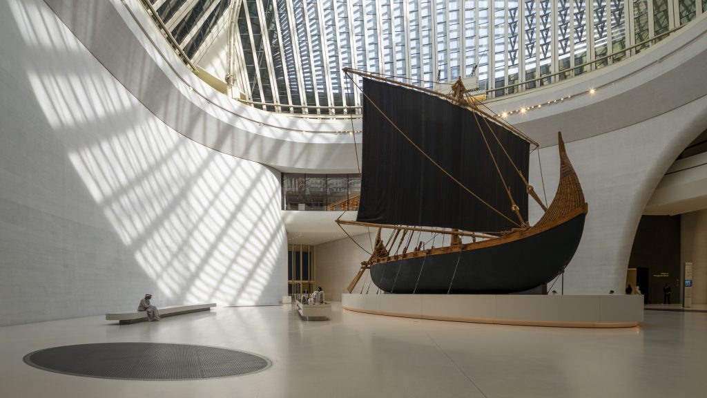 the Zayed National Museum in Abu Dhabi, designed by Foster + Partners, showcasing the five soaring falcon-wing-inspired steel structures and its contextual location in the Saadiyat Cultural District 11