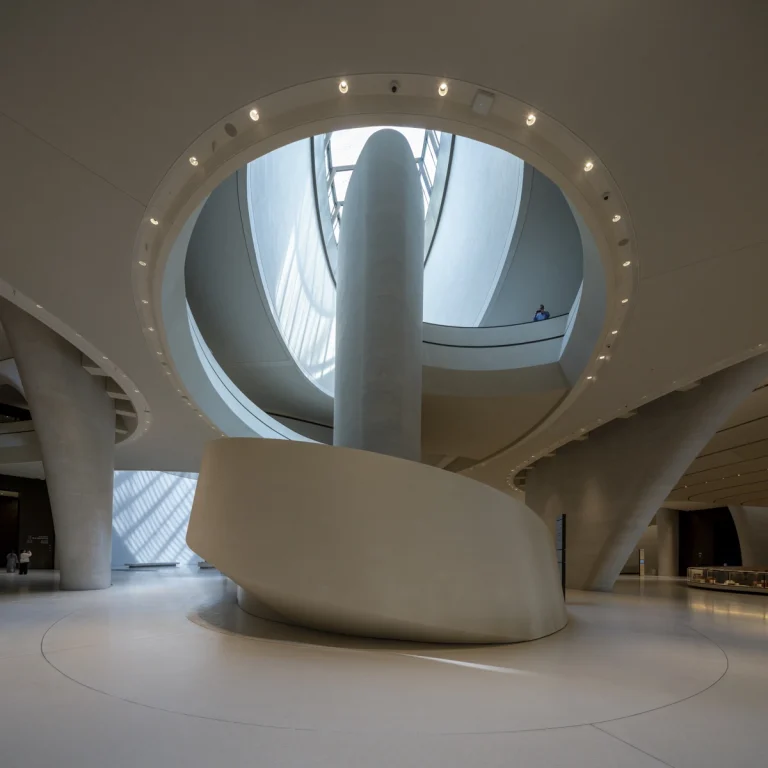 the Zayed National Museum in Abu Dhabi, designed by Foster + Partners, showcasing the five soaring falcon-wing-inspired steel structures and its contextual location in the Saadiyat Cultural District 11