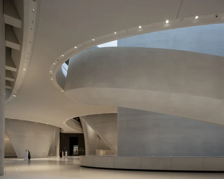 the Zayed National Museum in Abu Dhabi, designed by Foster + Partners, showcasing the five soaring falcon-wing-inspired steel structures and its contextual location in the Saadiyat Cultural District 11