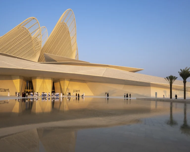 the Zayed National Museum in Abu Dhabi, designed by Foster + Partners, showcasing the five soaring falcon-wing-inspired steel structures and its contextual location in the Saadiyat Cultural District 11