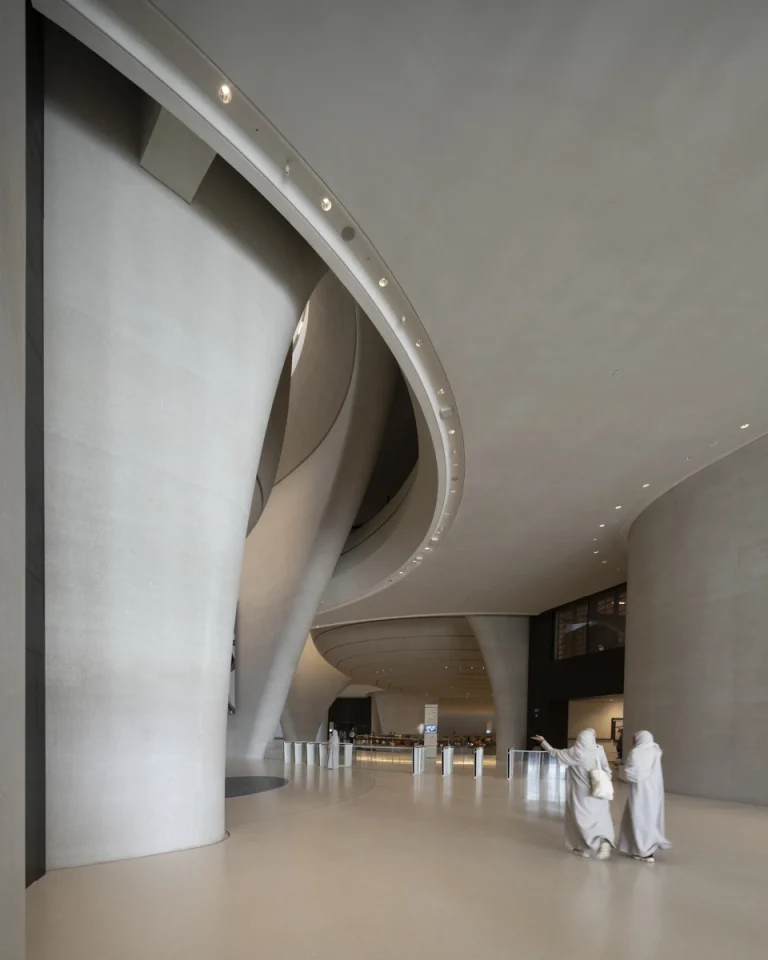 the Zayed National Museum in Abu Dhabi, designed by Foster + Partners, showcasing the five soaring falcon-wing-inspired steel structures and its contextual location in the Saadiyat Cultural District 11