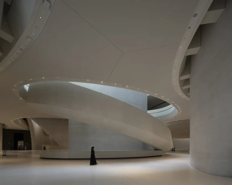 the Zayed National Museum in Abu Dhabi, designed by Foster + Partners, showcasing the five soaring falcon-wing-inspired steel structures and its contextual location in the Saadiyat Cultural District 11