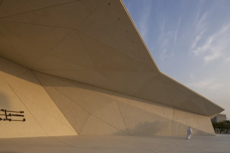 the Zayed National Museum in Abu Dhabi, designed by Foster + Partners, showcasing the five soaring falcon-wing-inspired steel structures and its contextual location in the Saadiyat Cultural District 11