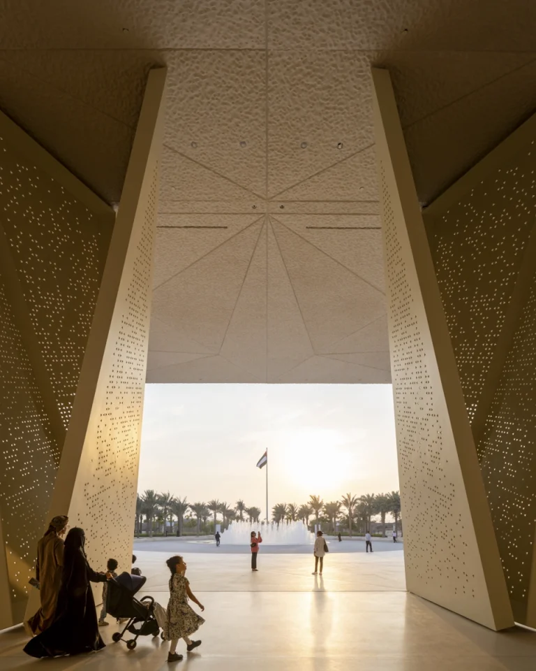 the Zayed National Museum in Abu Dhabi, designed by Foster + Partners, showcasing the five soaring falcon-wing-inspired steel structures and its contextual location in the Saadiyat Cultural District 11