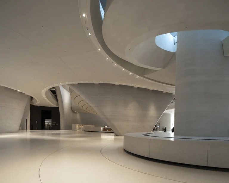 the Zayed National Museum in Abu Dhabi, designed by Foster + Partners, showcasing the five soaring falcon-wing-inspired steel structures and its contextual location in the Saadiyat Cultural District 11