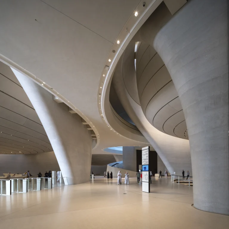 the Zayed National Museum in Abu Dhabi, designed by Foster + Partners, showcasing the five soaring falcon-wing-inspired steel structures and its contextual location in the Saadiyat Cultural District 11
