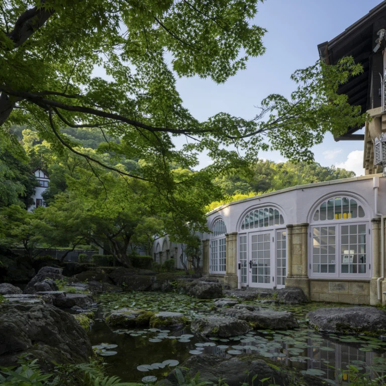 Architectural view of Asahi Beer Oyamazaki Villa Museum of Art in Osaka by Tadao Ando, photographed by award-winning Deed Studio, emphasizing the interplay of natural light, exposed concrete, and minimal form