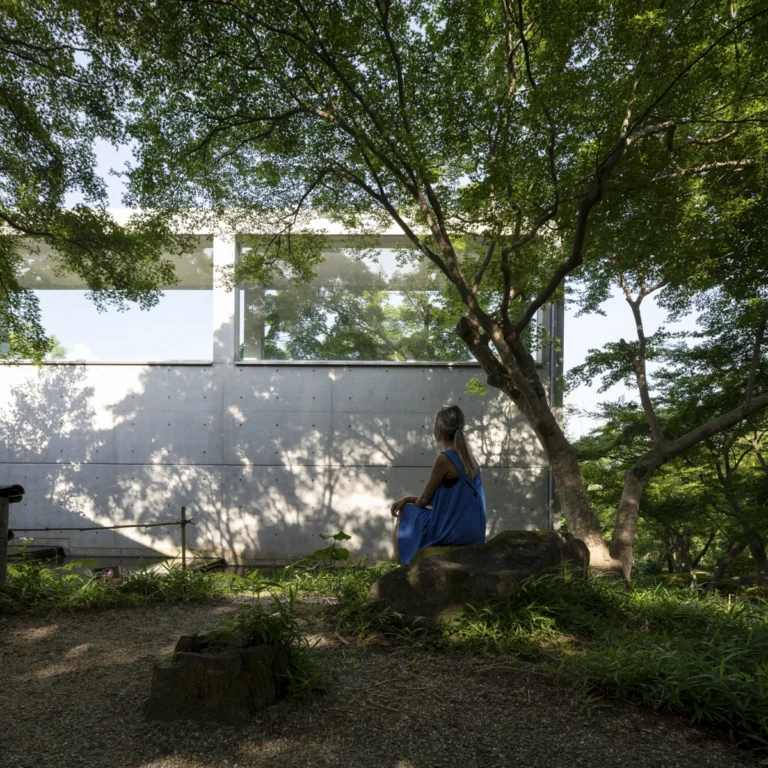 Architectural view of Asahi Beer Oyamazaki Villa Museum of Art in Osaka by Tadao Ando, photographed by award-winning Deed Studio, emphasizing the interplay of natural light, exposed concrete, and minimal form