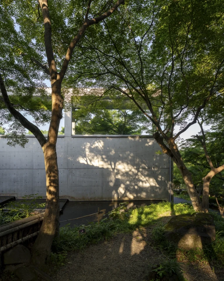 Architectural view of Asahi Beer Oyamazaki Villa Museum of Art in Osaka by Tadao Ando, photographed by award-winning Deed Studio, emphasizing the interplay of natural light, exposed concrete, and minimal form